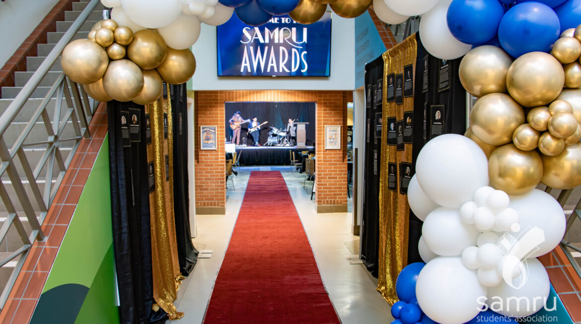 SAMRU Awards entrance. A balloon arch opens onto shimmering curtains that lead into Wyckham House